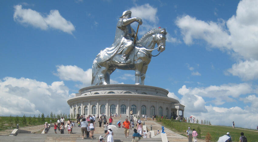 Silver Chinggis Khaan statue above its round base, Mongolia.