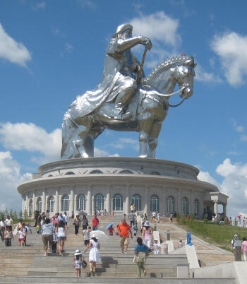 Silver Chinggis Khaan statue above its round base, Mongolia.
